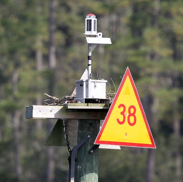 Channel marker with Osprey nesting platform