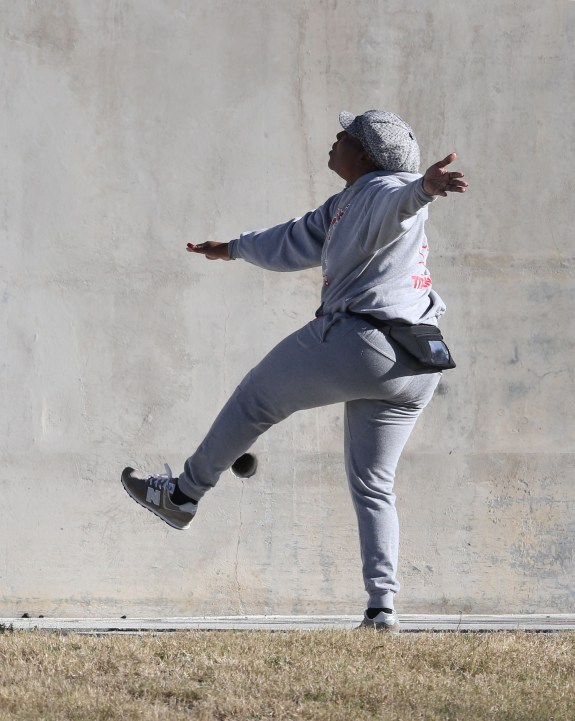 Young woman doing calisthentics